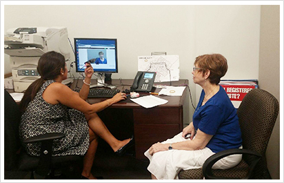 Staffer Rachel Hooper assists a constituent in our Germantown office during SEPTA’s Pass Photo ID Day in July.