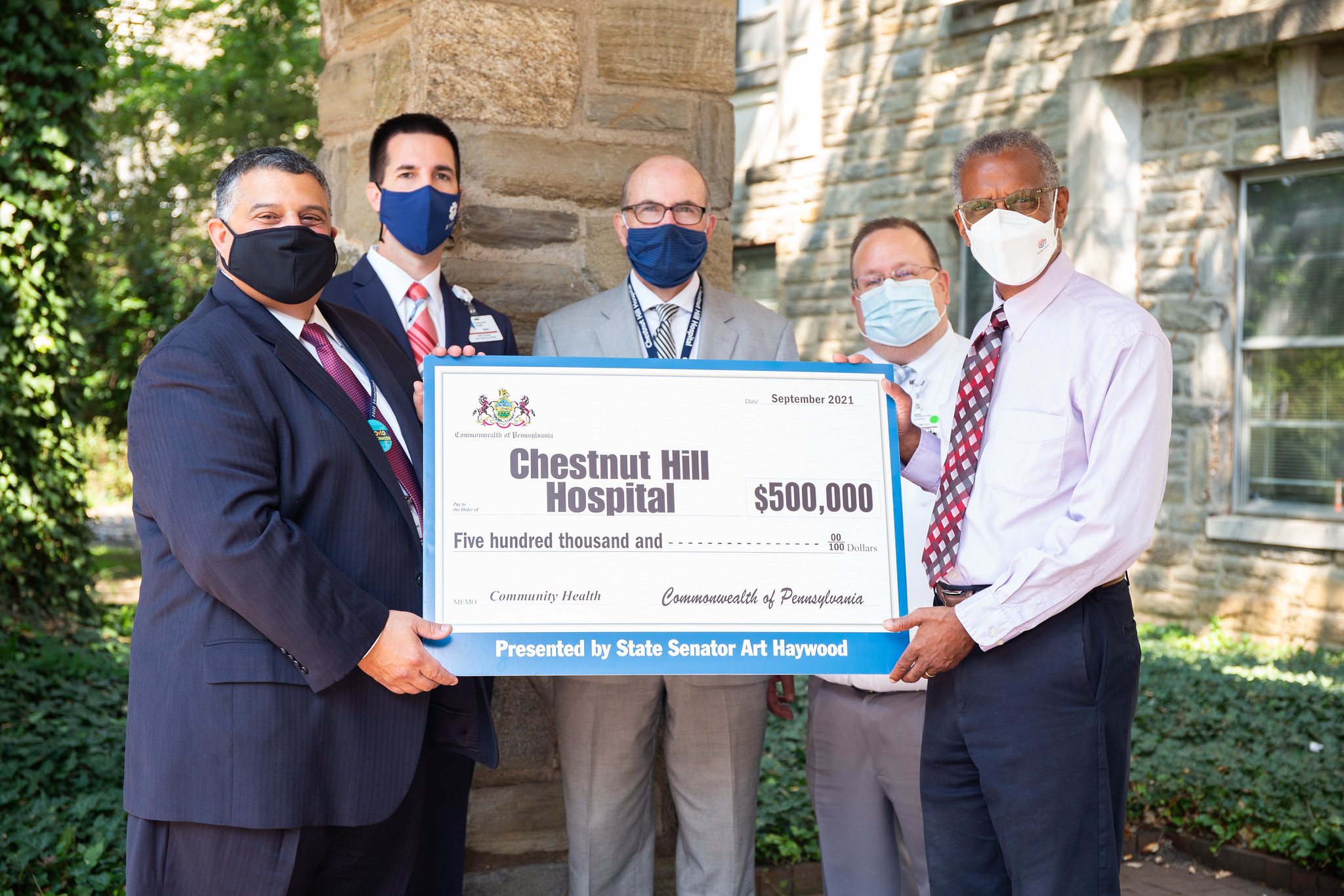 September 15, 2021: Sen. Haywood visited Chestnut Hill Hospital to deliver a check for $500,000 to purchase a new air conditioning unit for the facility.
