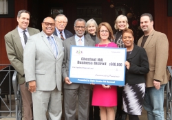 February 3, 2017: Senator Art Haywood presents the Chestnut Hill Business District with a check, made possible through a PA Department of Community and Economic Development grant program, that will go toward the improvement of pedestrian lighting and safety in the commercial corridor.